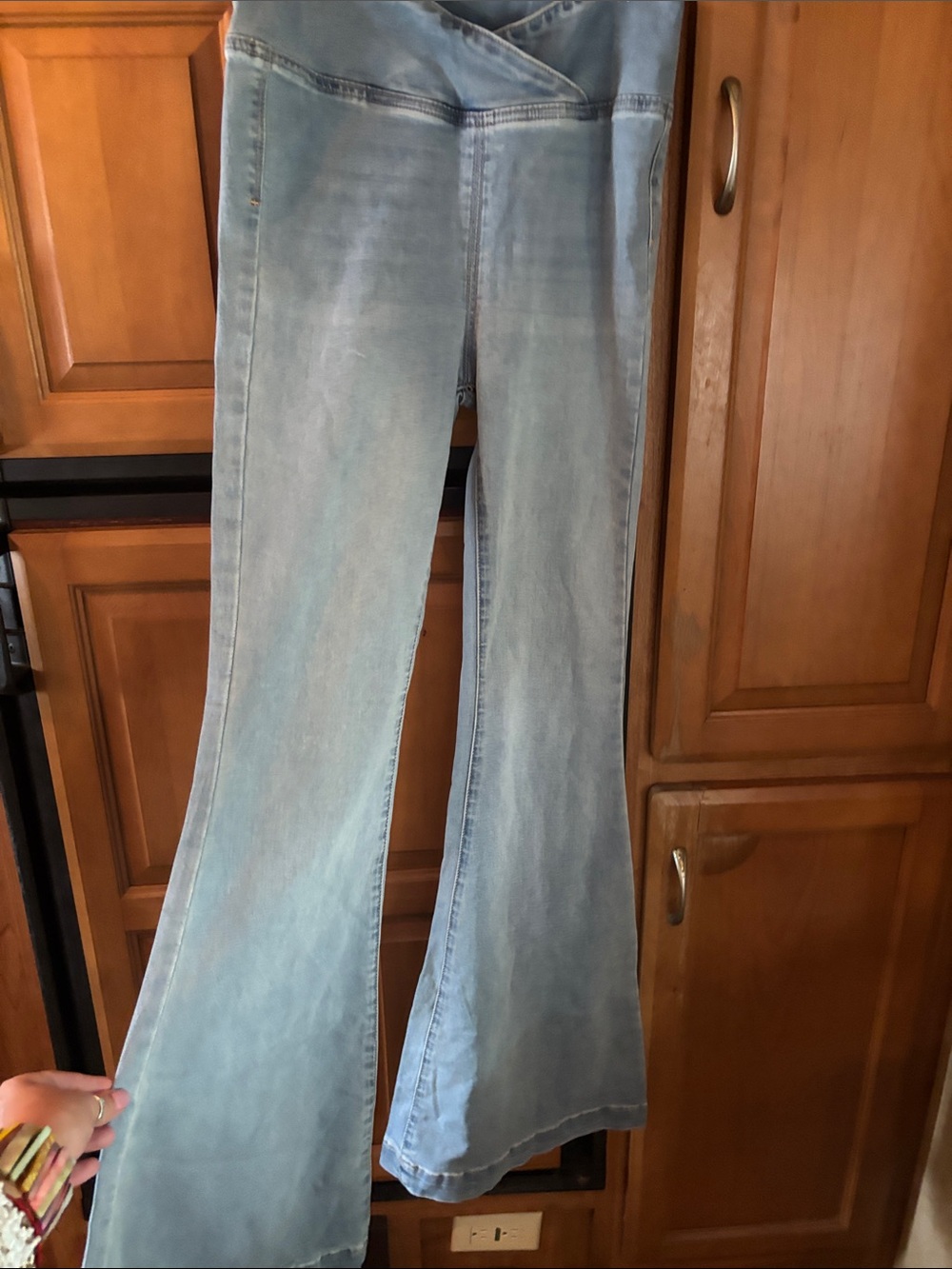 We The Free Light Blue bell bottom Jeans with Crossover Waist
